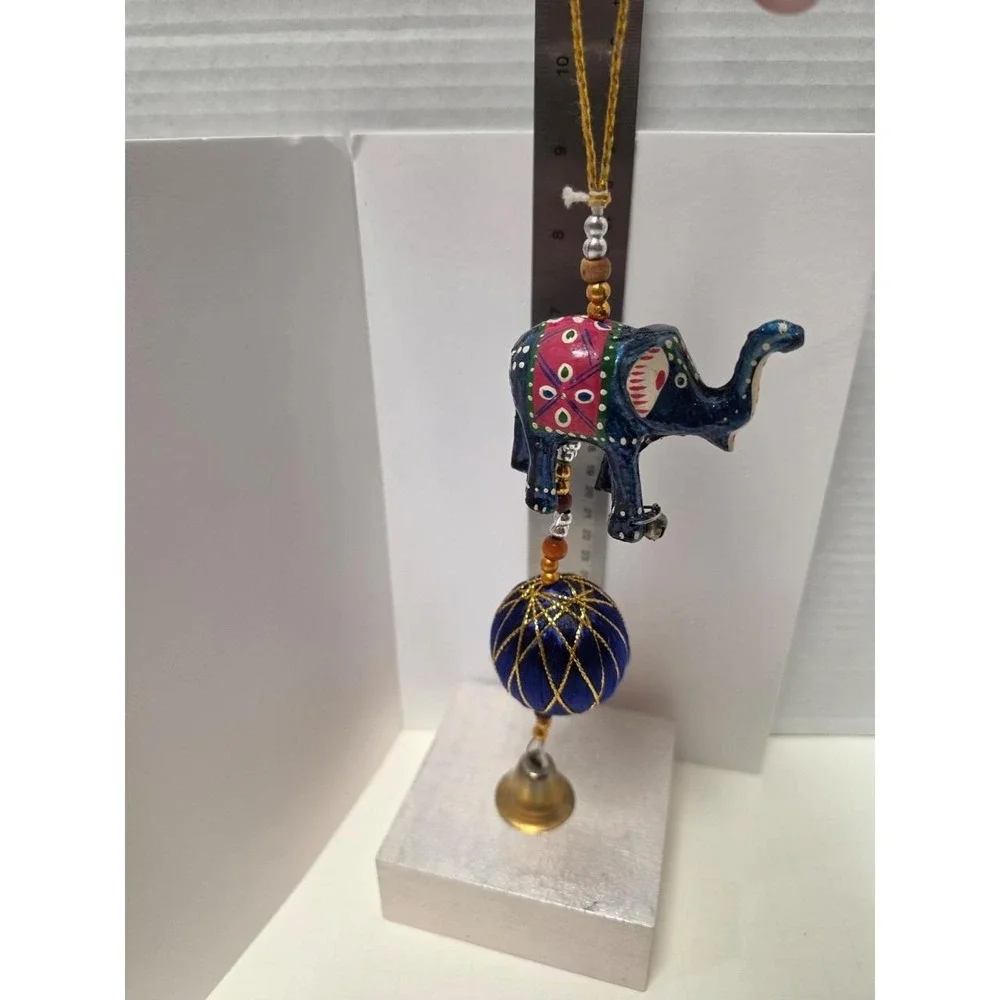 handcrafted Indian-style‎ decorative elephant hanging, likely made from wood